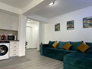BV GLAM APARTMENTS Cazare Apartamente 1-2-3 cam Regim Hotelier Coresi - imagine 3