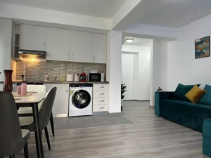 BV GLAM APARTMENTS Cazare Apartamente 1-2-3 cam Regim Hotelier Coresi - imagine 4