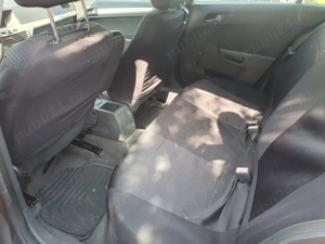 Opel Astra H 2008 - imagine 4