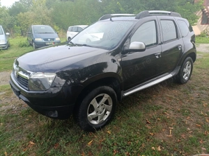 Dacia Duster 4x4 1, 6 benzina  - imagine 7