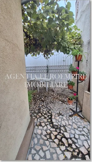 Garsoniera de inchiriat la curte zona Capitol - imagine 2