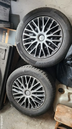 Vand roti pe 17'', cu anv. Continental+ un set de capace