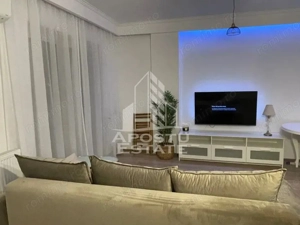 Apartament cu 2 camere, zona Torontal-Vox, Centrala Proprie - imagine 2 Apartament cu 2 camere, zona Torontal-Vox, Centrala Proprie - imagine 2