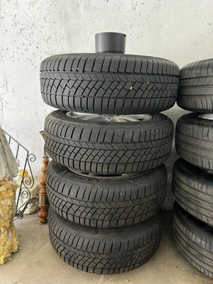 Vând roți complete Continental runflat originale BMW 205x60x16 noi.