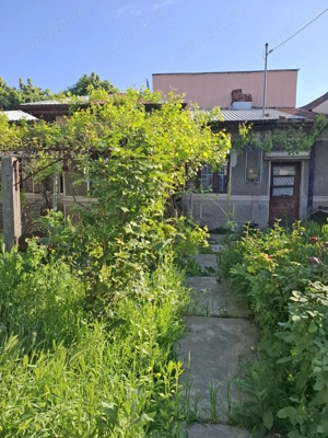 Propietar vand casa Bucurestii Noi,3 camere,140mp,deschidere 13mp,utilitati trase,teren constructie.