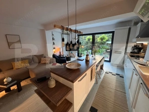 Apartament deosebit cu 3 camere și grădină amenajată