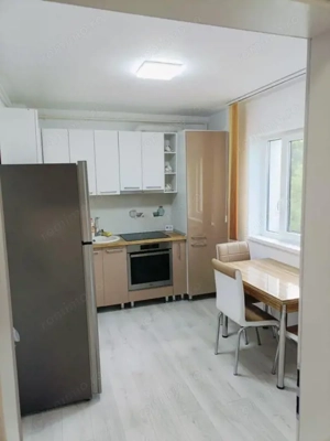 Garsoniera decomandata 46mp utili + loc de parcare subteran zona Tractorul  - imagine 4