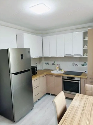 Garsoniera decomandata 46mp utili + loc de parcare subteran zona Tractorul  - imagine 3