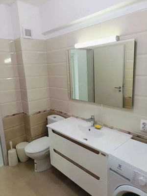 Garsoniera decomandata 46mp utili + loc de parcare subteran zona Tractorul  - imagine 7