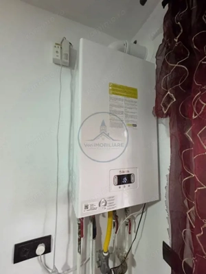  Garsonieră cu spațiu generos la demisol – locație centrală  - imagine 3