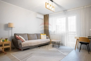 Apartament cu 2 camere,  2 băi și parcare subterană în Tractorul