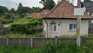 Proprietate cu două case de vânzare în Curtea de Argeș, zona Noapteș.