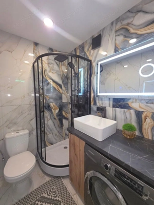 Garsoniera de inchiriat in zona Stefan cel Mare cu centrala proprie - imagine 2