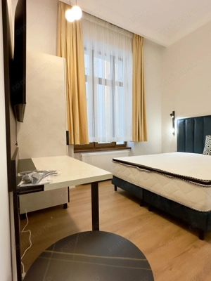 Magheru: 5 camere cu băi proprii – ideal business sau birouri