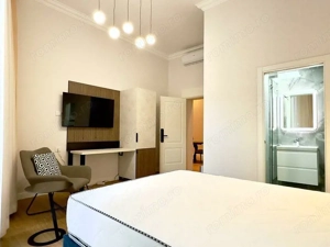 Magheru: 5 camere cu băi proprii – business regim hotelier care deja produce.