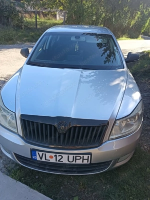 Vând sau schimb SKODA Octavia 2 2009 1,9 berlina  - imagine 4 Vând sau schimb SKODA Octavia 2 2009 1,9 berlina  - imagine 4