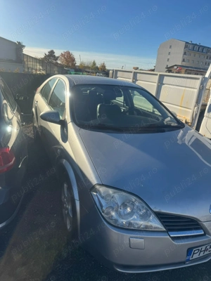 Dezmembrez Nissan Primera  2.0 benzina an 2005 cutie viteze automata tip motor QR20