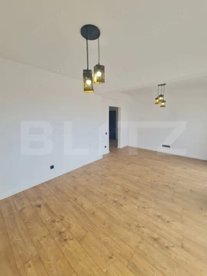 Apartament finisat, 52 mp utili, terasa 34 mp, zona Terra - imagine 6
