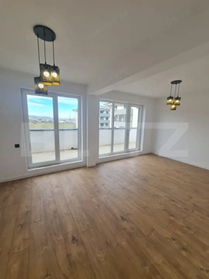 Apartament finisat, 52 mp utili, terasa 34 mp, zona Terra - imagine 2