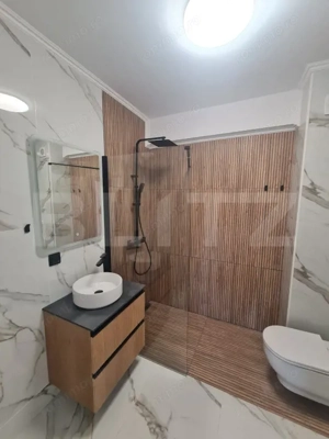 Apartament finisat, 52 mp utili, terasa 34 mp, zona Terra - imagine 8