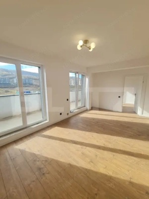 Apartament finisat, 52 mp utili, terasa 34 mp, zona Terra