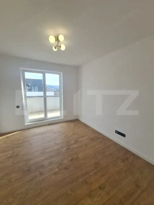Apartament finisat, 52 mp utili, terasa 34 mp, zona Terra - imagine 5
