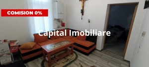 Constructie cu 3 apartamente + teren+ 2 spatii comerciale