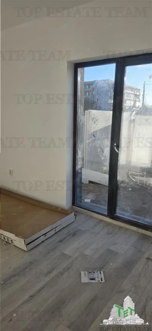 Bragadiru cart. Independentei  Vanzare apartament 2 camere in vila  curte proprie  2 locuri de parca - imagine 17