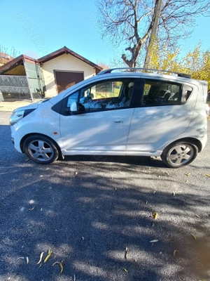 O masina micuta si fasneata - imagine 4