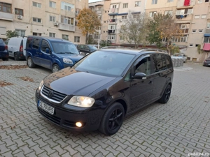 vw touran fab 2007 motor 1.9tdi bine întreținut 2 seturi de jante iarna si vara