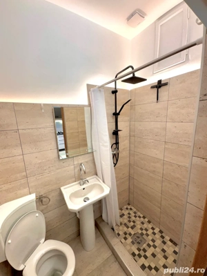 Apartament nou renovat de închiriat - 200m de centrul Cisnădiei - imagine 9