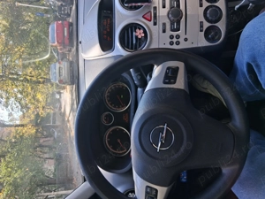 Opel Corsa D 1.3 cdti - imagine 6