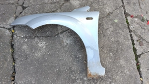 Aripa stanga fata FORD FOCUS  2005 -2008 gri argintiu