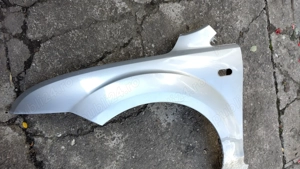 Aripa stanga fata FORD FOCUS  2005 -2008 gri argintiu - imagine 2