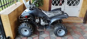 Vând atv 125 transmisie pe cardan necesita un capac ambreiaj preț 1300 euro 