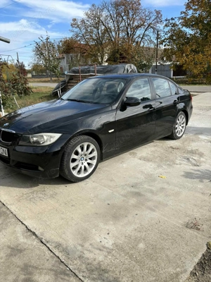 Vand sau schimb bmw an 2007 motor 2000 benzina