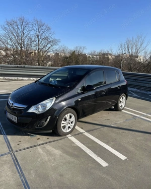 Opel corsa D 2011 - imagine 2