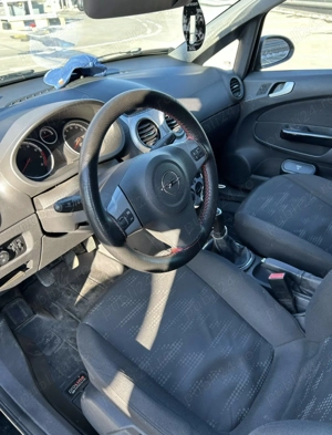 Opel corsa D 2011 - imagine 8