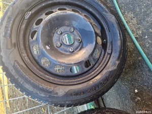Vând set cauciucuri de iarna 205/55/16 cu capace,jenti tabla pentru skoda octavia - imagine 5