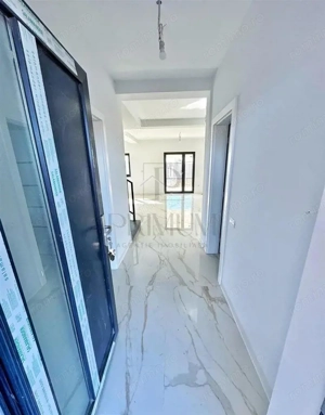 Duplex despartit prin camera tehnica - zona buna - finisaje premium - teren generos - imagine 4
