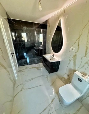 Duplex despartit prin camera tehnica - zona buna - finisaje premium - teren generos - imagine 8