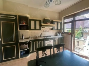 Apartament la casa, cu curte, central de inchiriat - imagine 2