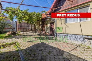 Casă primitoare în Satulung, Săcele –curte generoasă și garaj, aproape de Brașov