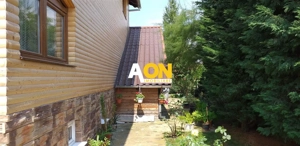 Casă stil american, structură de lemn, 176 mp utili, teren 1400 mp - imagine 2