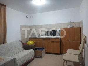 Apartament la casa 97 mpu 5 camere 2 bucatarii 3 bai gradina Cisnadie - imagine 7