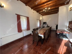 Pensiune de 7 camere cu 5 bai si teren de 377mp situata in Paltinis - imagine 3