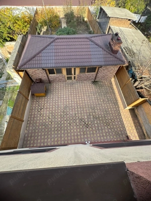 Casă de vânzare + 2 spații comerciale funcționale + foișor acoperit - imagine 3