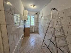 situat pe frumoasa strada HARNICIEI la etaj 1- bloc izolat termic-centrala gaz - imagine 9