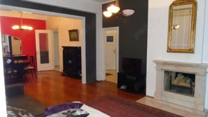 Apartament cu 4 camere, cu o suprafață utilă de 105 m2, situat între Piața Română și Calea Victoriei