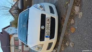 Vând suzuki splash benzină+gpl, preț 2600 euro,ușor negociabil - imagine 3